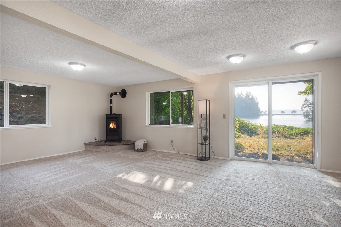 19605 Whiteman Cove Road Southwest Lakebay, WA 98351 - Photo 20 of 40 a view of an empty room with a window