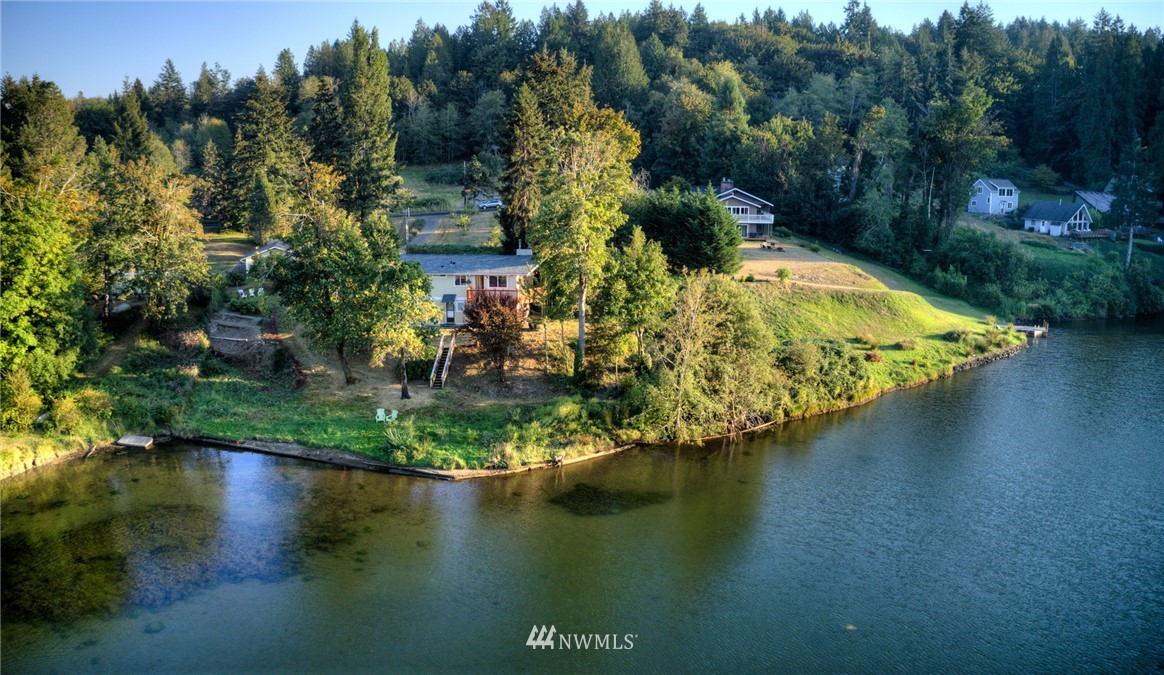 19605 Whiteman Cove Road Southwest Lakebay, WA 98351 - Photo 34 of 40 a view of a lake with houses