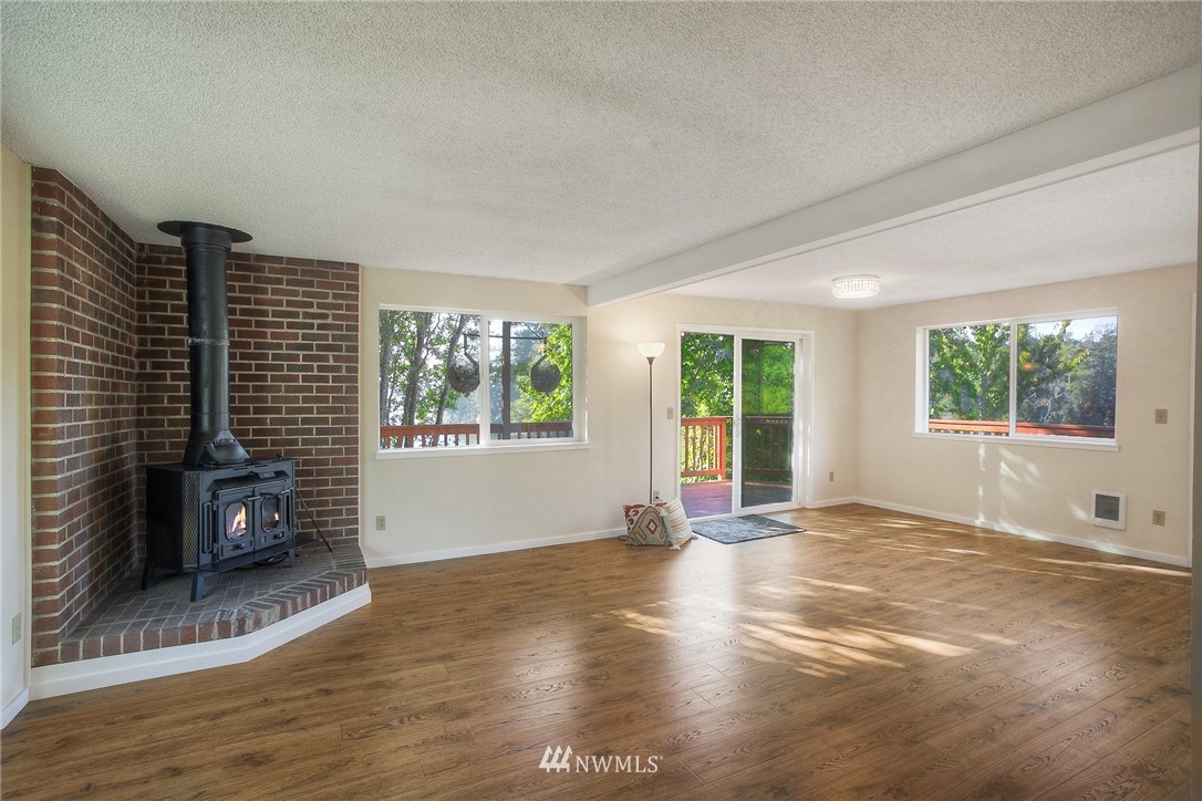 19605 Whiteman Cove Road Southwest Lakebay, WA 98351 - Photo 6 of 40 a view of livingroom with furniture and windows