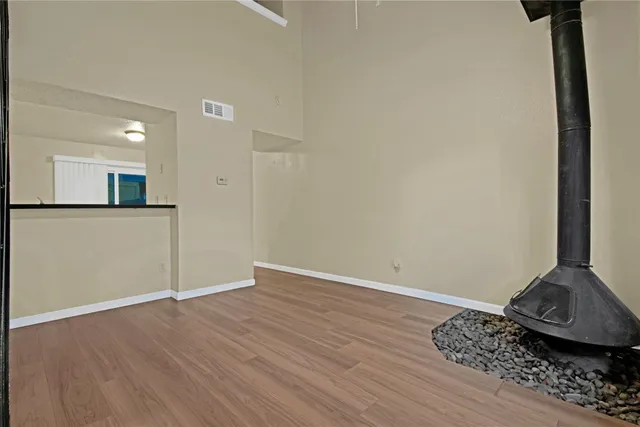 a view of a livingroom with wooden floor