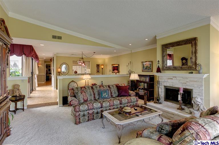 2031 Rosemont Avenue, Unit 2 Pasadena, CA 91103 - Photo 11 of 33 a living room with furniture and a fireplace