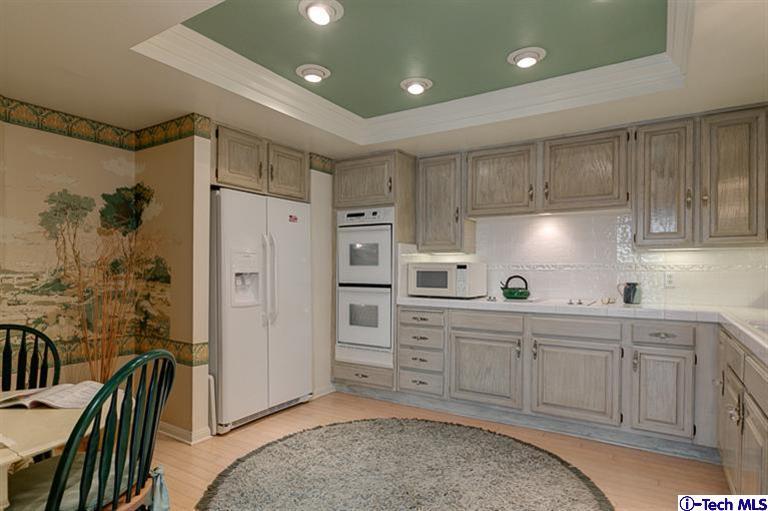 2031 Rosemont Avenue, Unit 2 Pasadena, CA 91103 - Photo 14 of 33 a kitchen with stainless steel appliances granite countertop a refrigerator and a sink