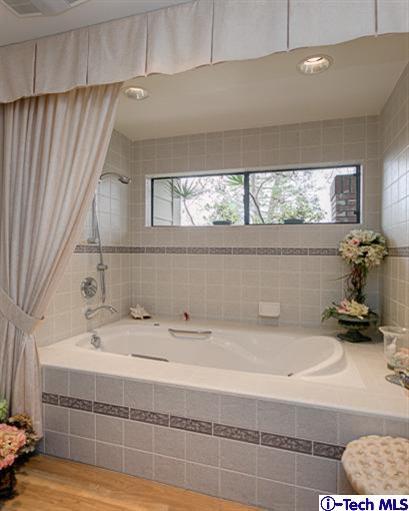 2031 Rosemont Avenue, Unit 2 Pasadena, CA 91103 - Photo 21 of 33 a bathroom with a sink and a mirror