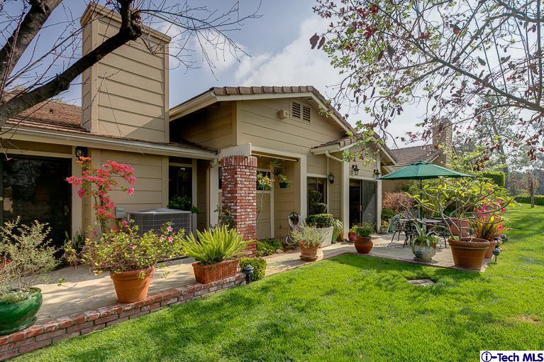 2031 Rosemont Avenue, Unit 2 Pasadena, CA 91103 - Photo 27 of 33 a view of a house with sitting area and garden
