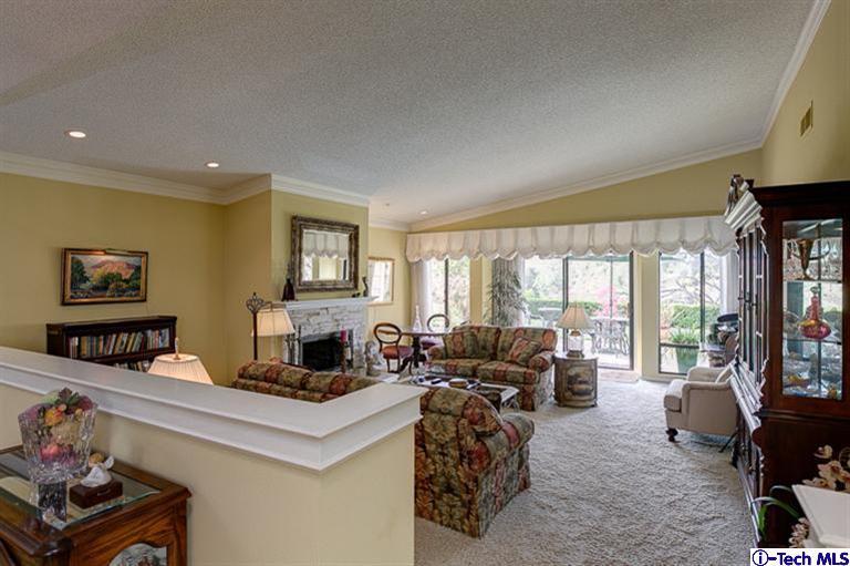 2031 Rosemont Avenue, Unit 2 Pasadena, CA 91103 - Photo 8 of 33 a living room with furniture large window and flat screen tv