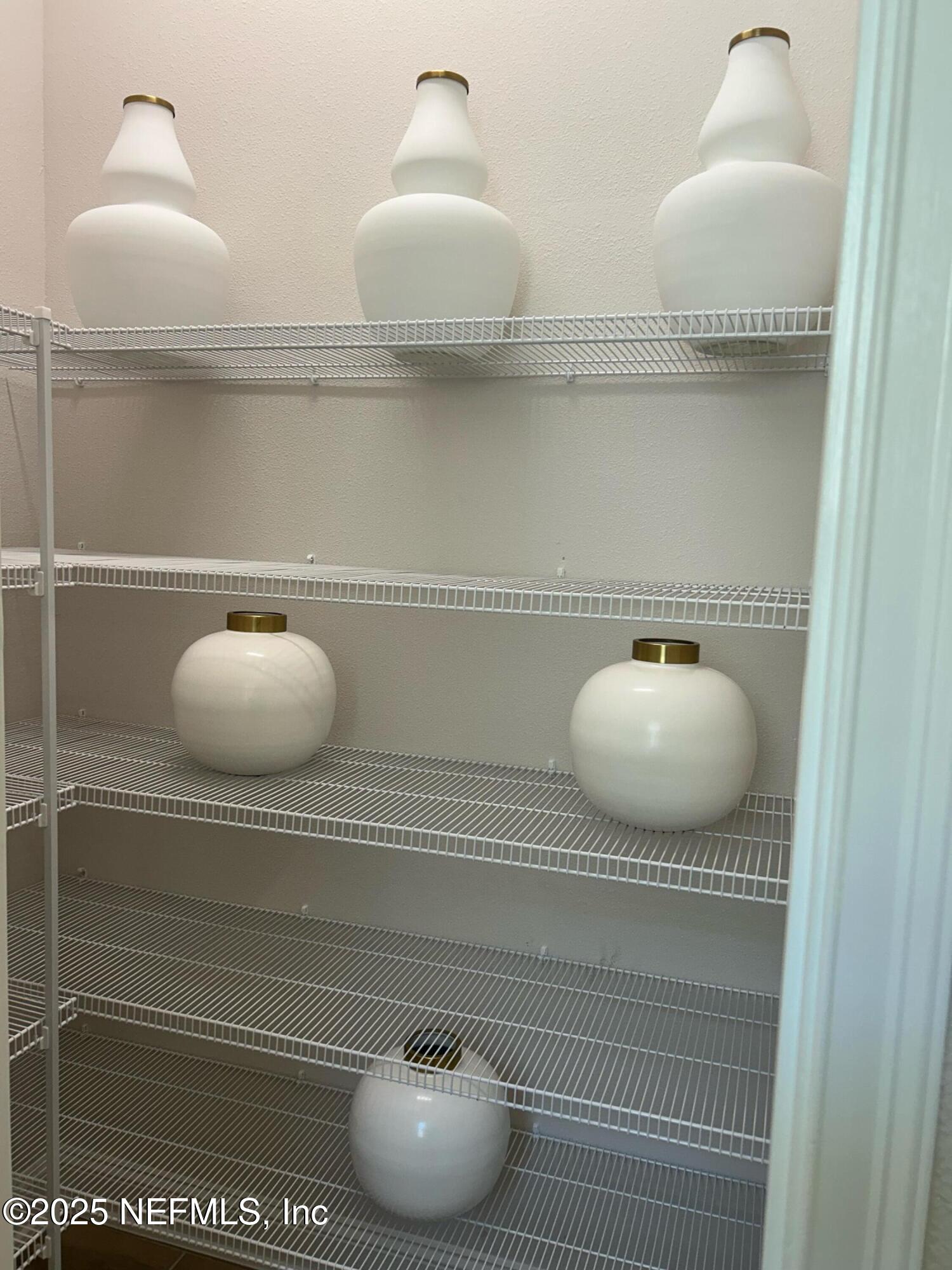 486 Navigators Road St. Johns, FL 32259 - Photo 11 of 22 a bathroom with a mirror