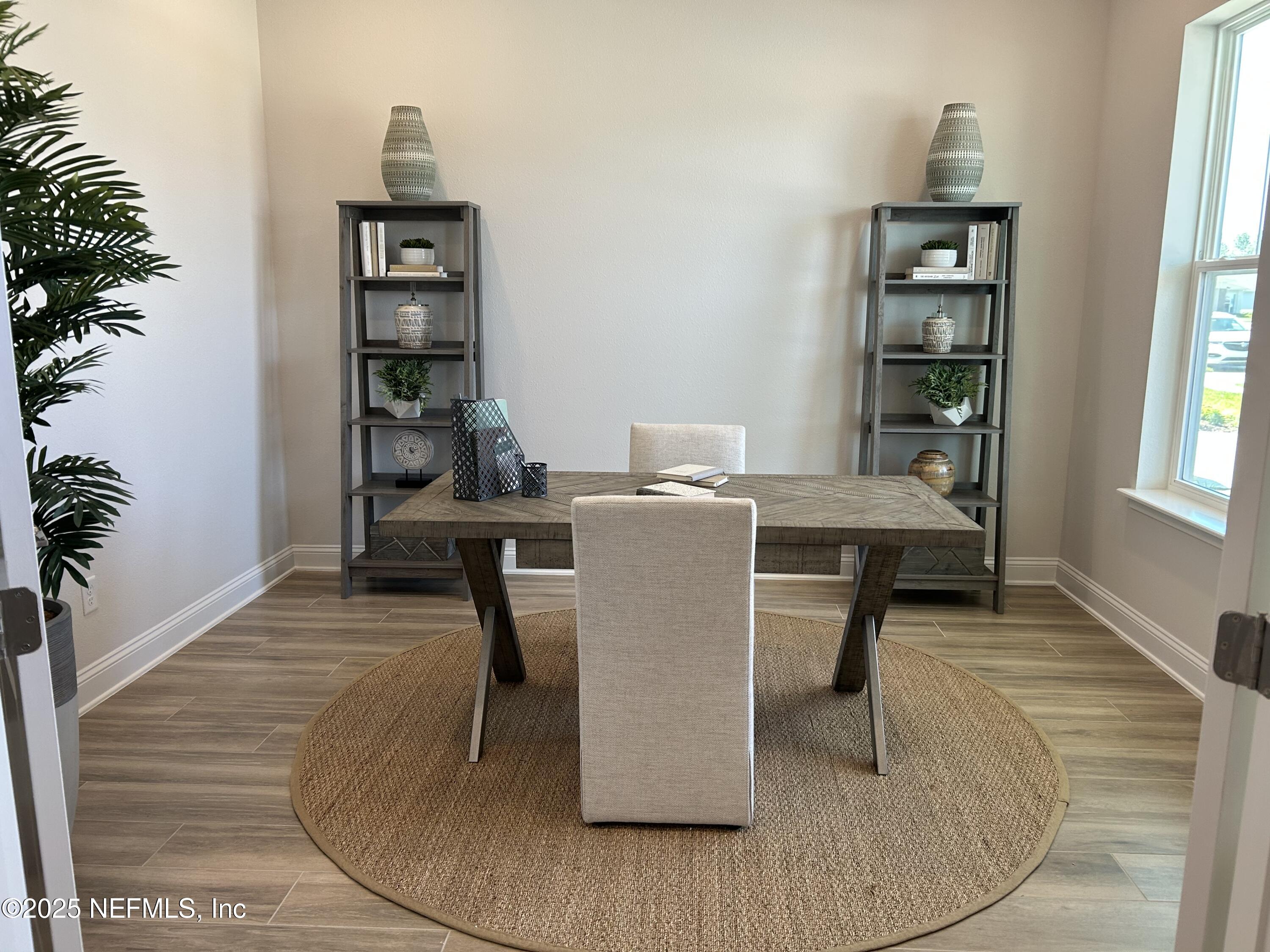 486 Navigators Road St. Johns, FL 32259 - Photo 2 of 22 a workspace with furniture and window