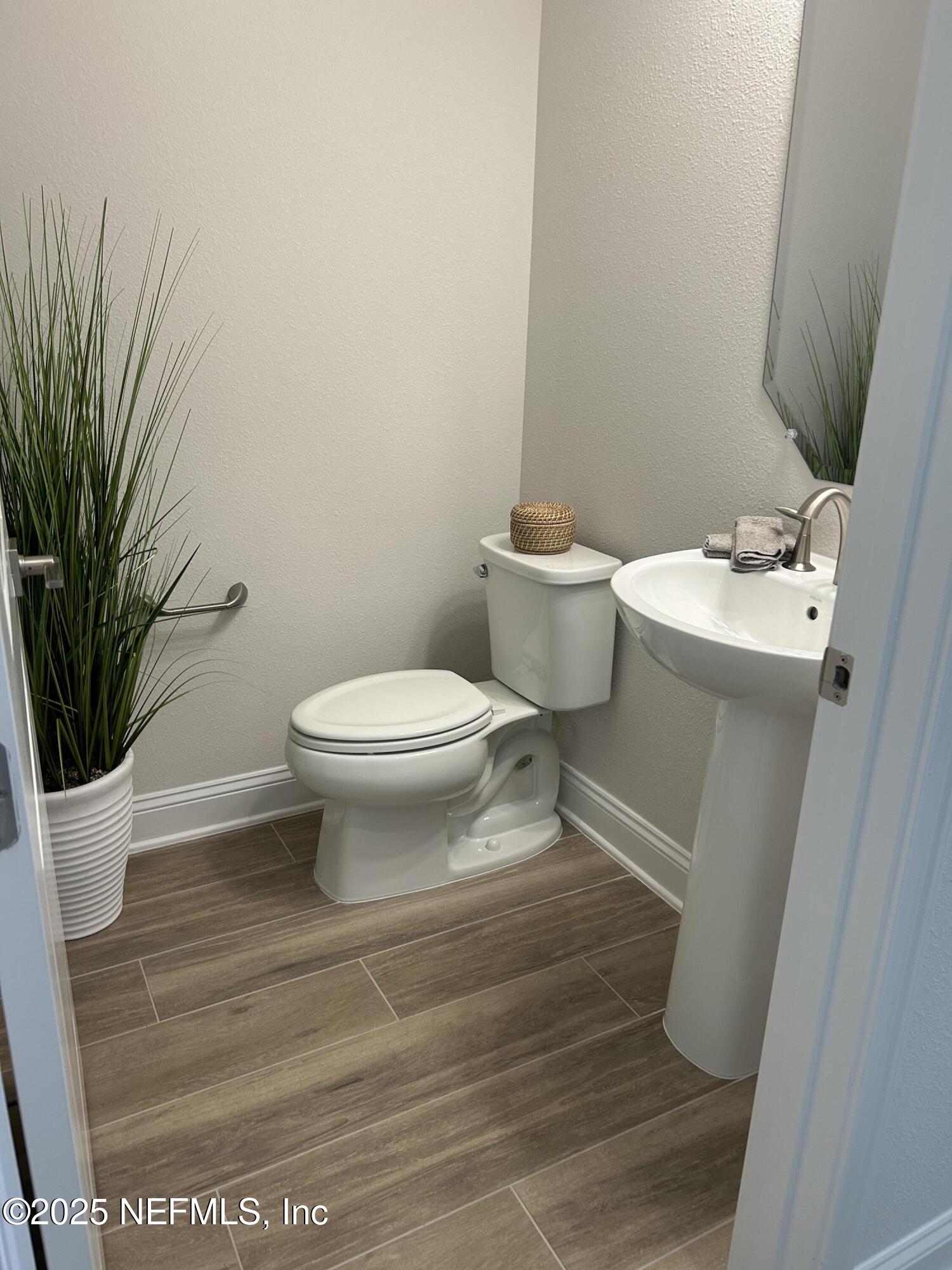 486 Navigators Road St. Johns, FL 32259 - Photo 4 of 22 a bathroom with a toilet and a shower