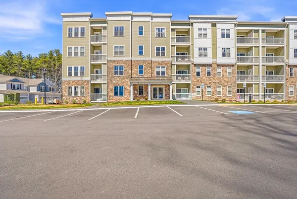 a front view of a building with street view