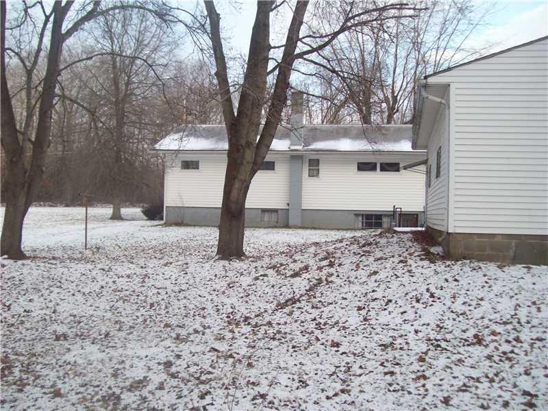 265 Herman Road Fombell, PA 16123 - Photo 5 of 24 Exterior Back.
