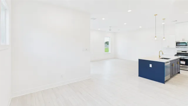 a view of a balcony with yard