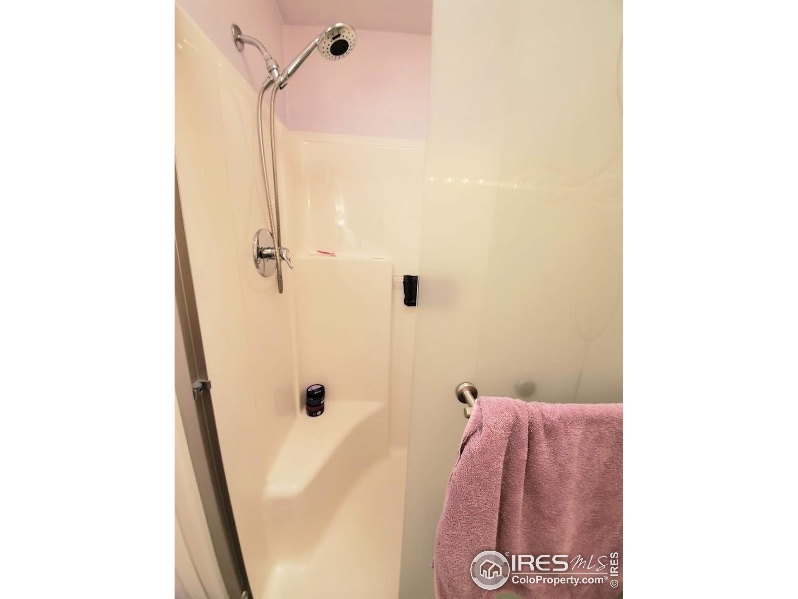 605 West 57th Street, Unit 42 Loveland, CO 80538 - Photo 17 of 38 a bathroom with a shower