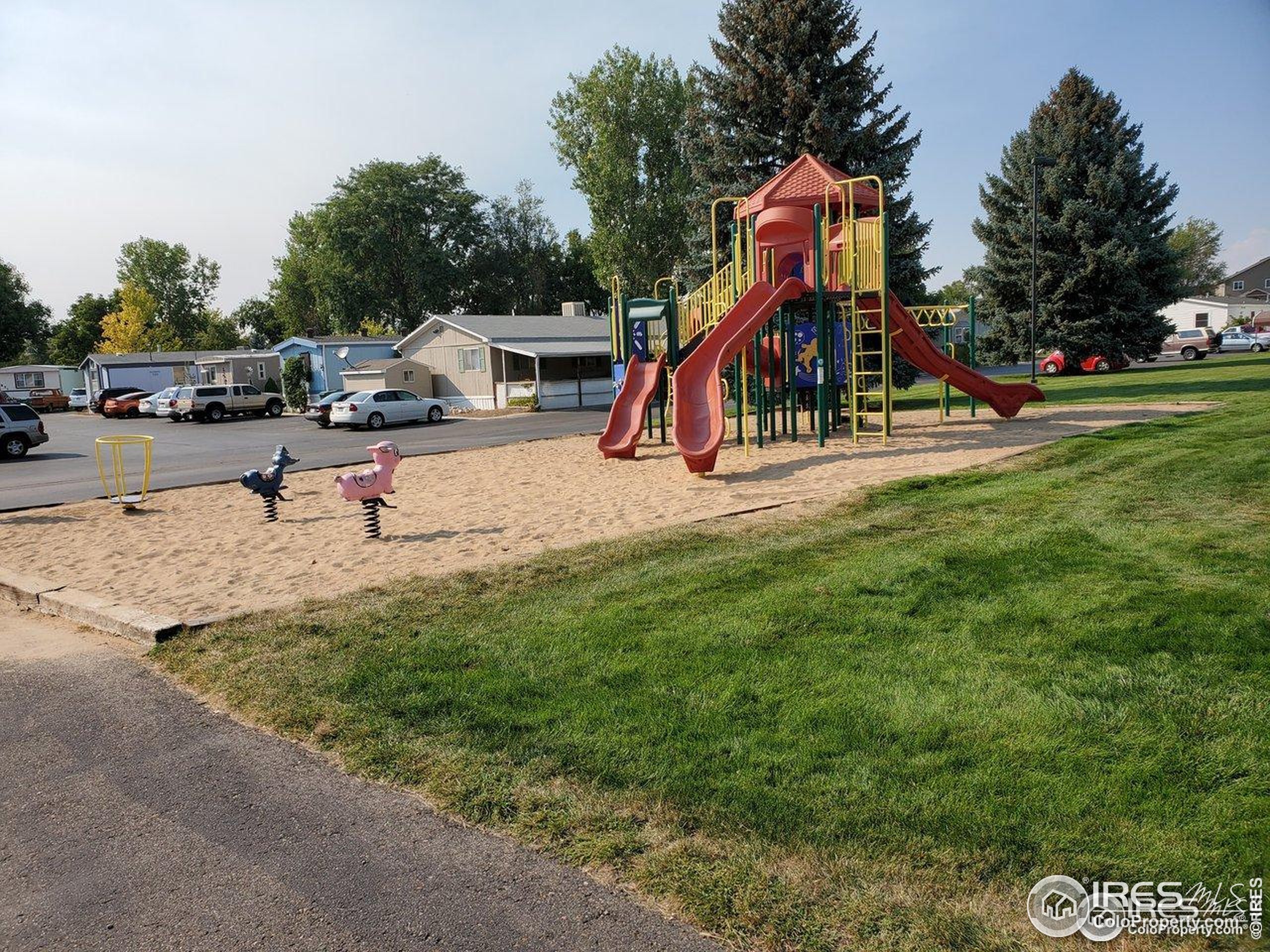 605 West 57th Street, Unit 42 Loveland, CO 80538 - Photo 36 of 38 a view of outdoor space with garden and entertaining space
