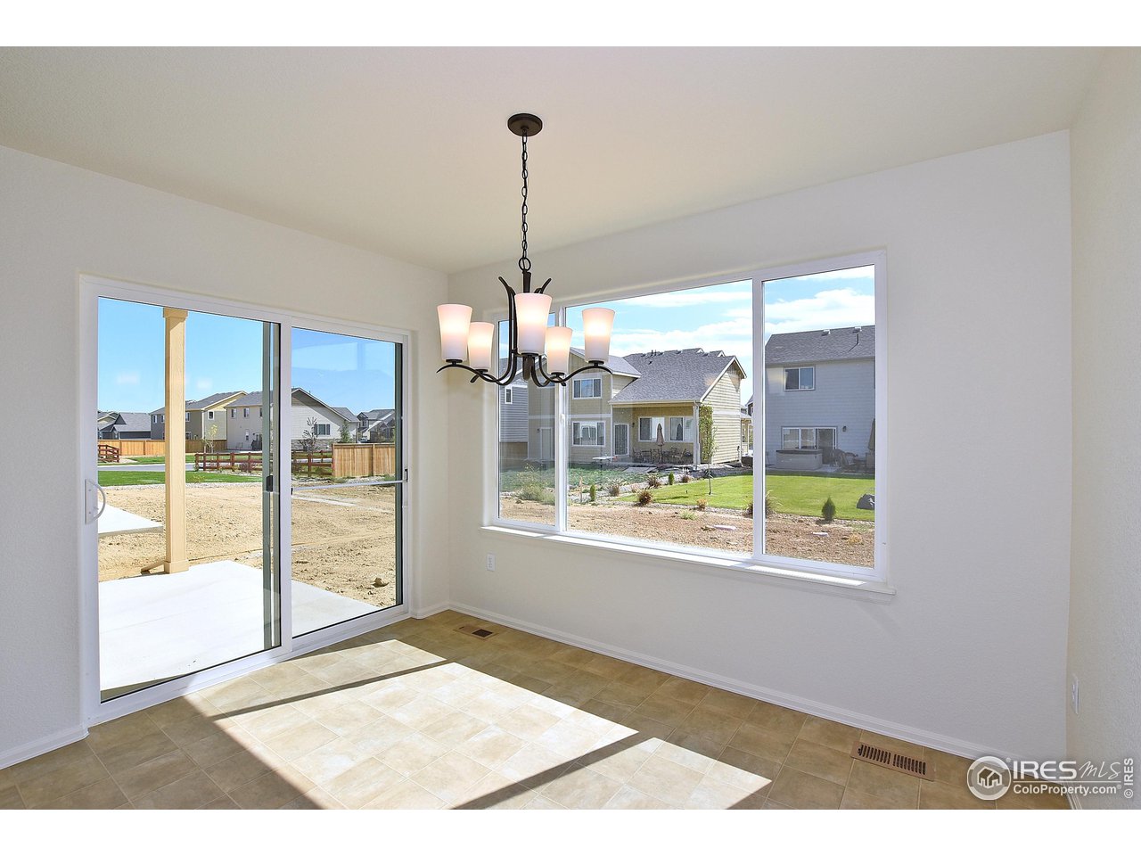 2270 Sublime Drive Windsor, CO 80550 - Photo 18 of 39 a view of an empty room and window
