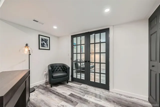 a living room with a couch and a window
