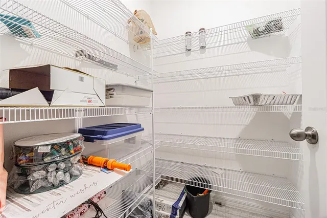 a room with gym equipment and a large window