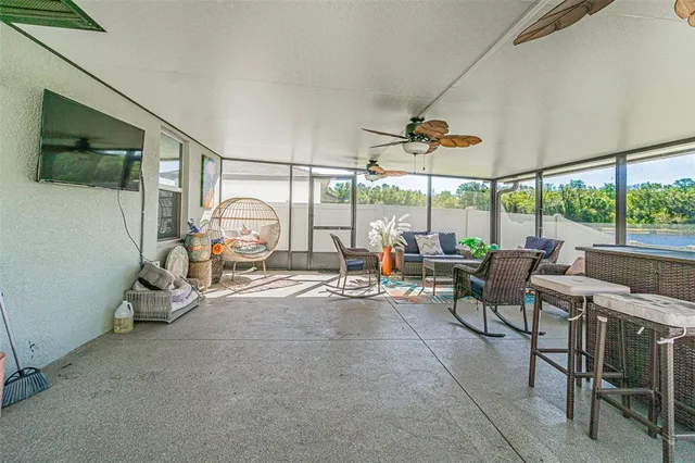 an aerial view of a house with a ocean view