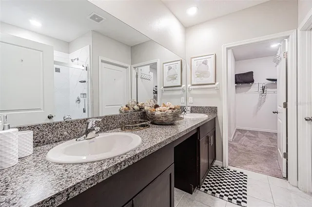 a bedroom with a bed and furniture