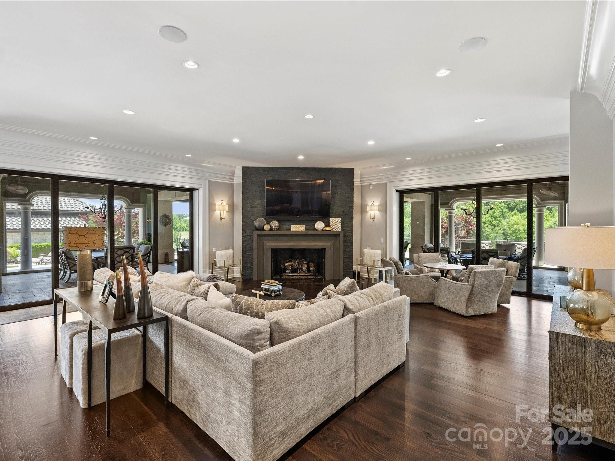 18308 Shearer Road Davidson, NC 28036 - Photo 20 of 48 a living room with fireplace furniture and a large window