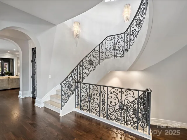 a view of a living room with furniture and a flat screen tv