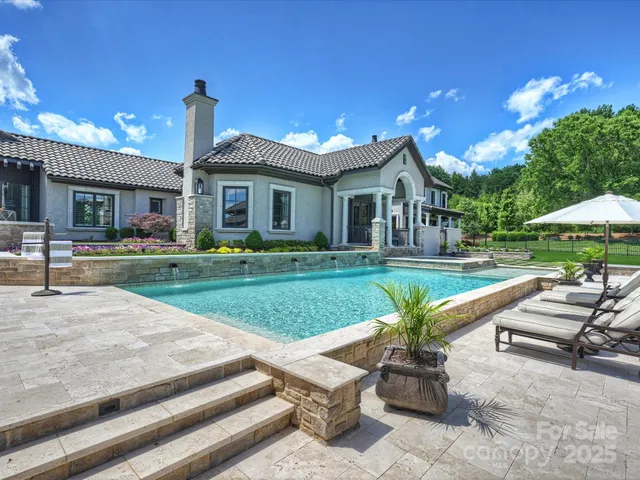 a view of a swimming pool and outdoor space