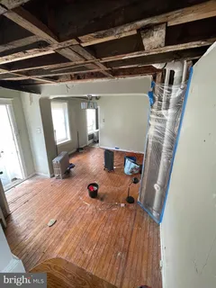 a view of lobby with a ceiling fan