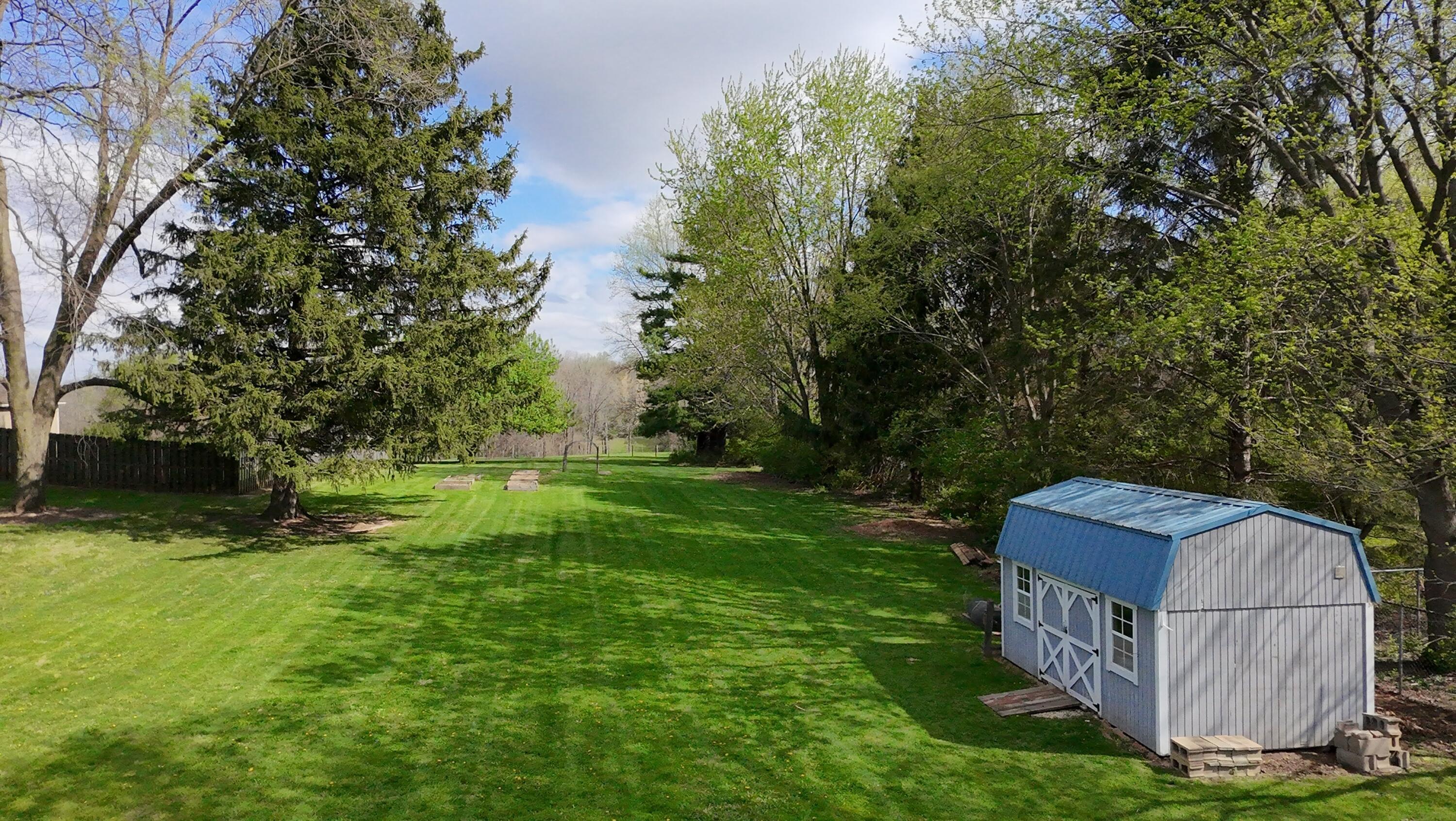 1042 Willow Road Springfield, OH 45502 - Photo 2 of 15 dji_fly_20260413_110438_0146_17761123392