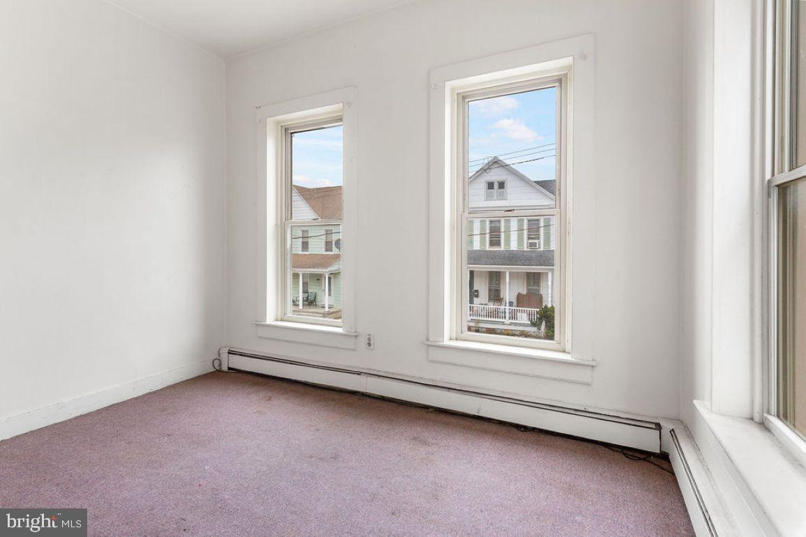 138 Pleasant Street Hanover, PA 17331 - Photo 13 of 39 an empty room with windows