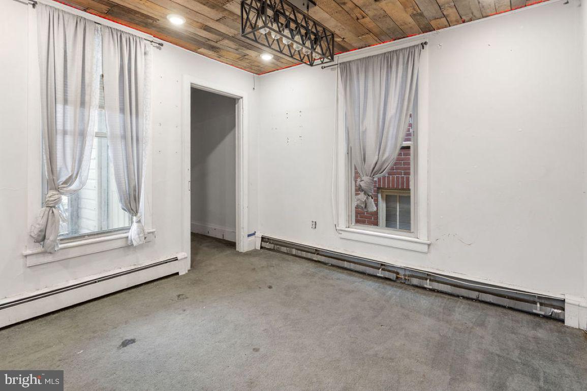 138 Pleasant Street Hanover, PA 17331 - Photo 25 of 39 a view of an empty room with a window