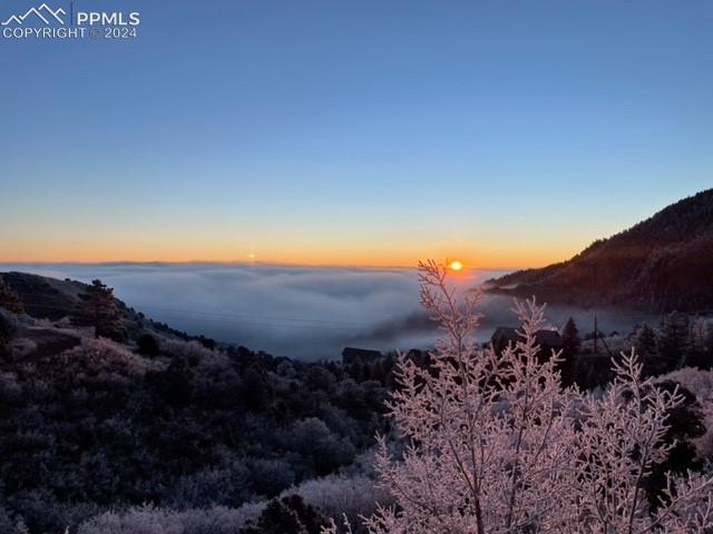 915 Oak Ridge Road Manitou Springs, CO 80829 - Photo 45 of 50 Sun Rise View over the clouds