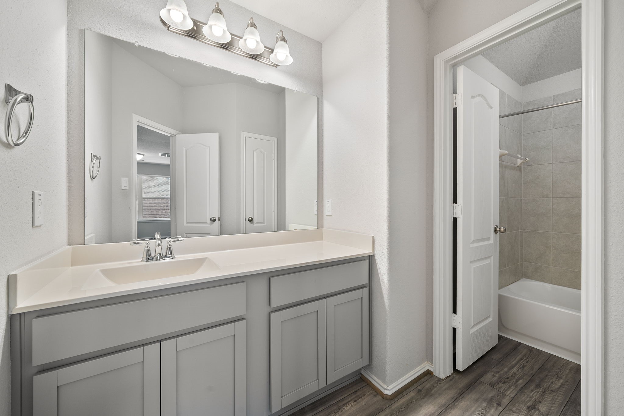 2330 Ocean Pass Lane Rosenberg, TX 77469 - Photo 16 of 20 a bathroom with a sink double vanity granite tub and shower