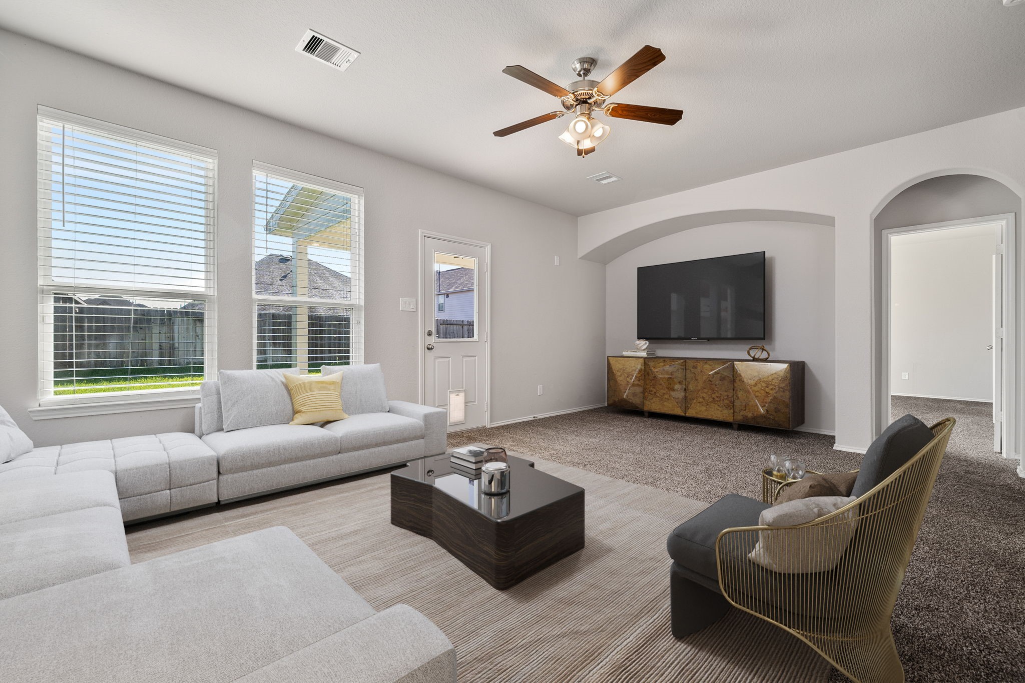 2330 Ocean Pass Lane Rosenberg, TX 77469 - Photo 5 of 20 a living room with furniture and a flat screen tv