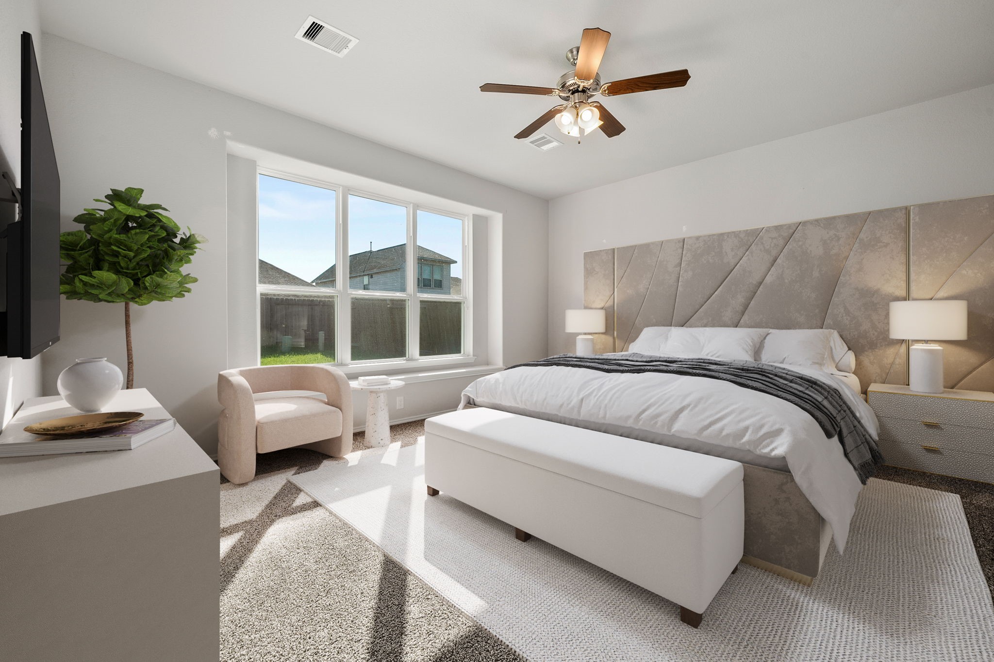 2330 Ocean Pass Lane Rosenberg, TX 77469 - Photo 8 of 20 a bedroom with a bed a couch and a potted plant