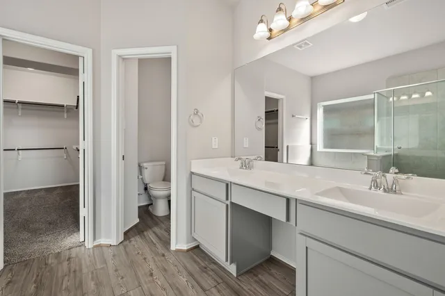 a white bath tub sitting next to a window