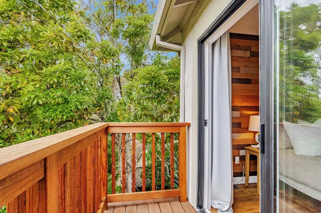 a view of a small yard from a balcony