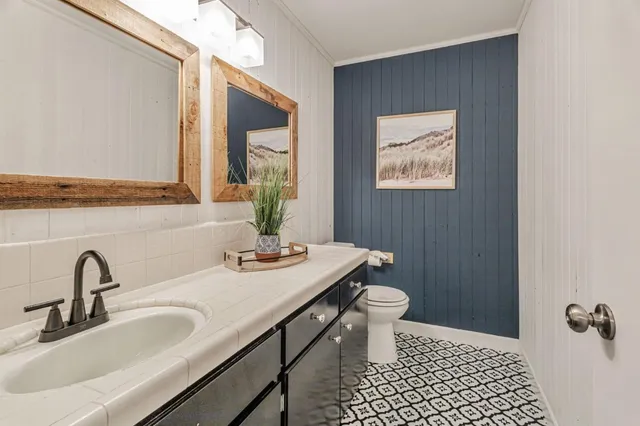 a bathroom with a sink and a toilet