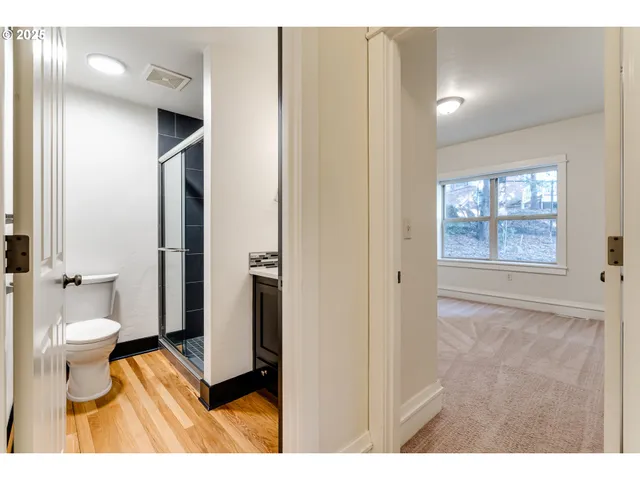 a bathroom with a toilet and a sink