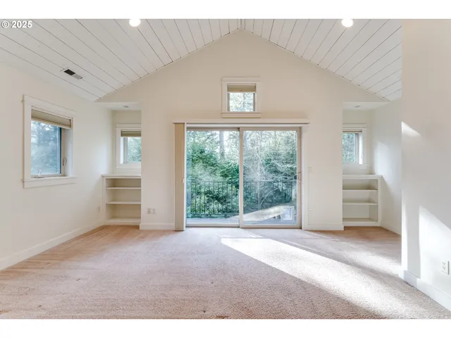 a view of empty room with a window