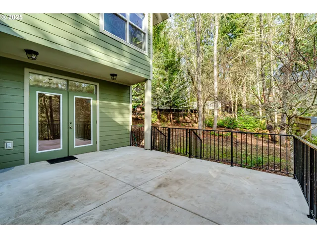 a view of a backyard of the house