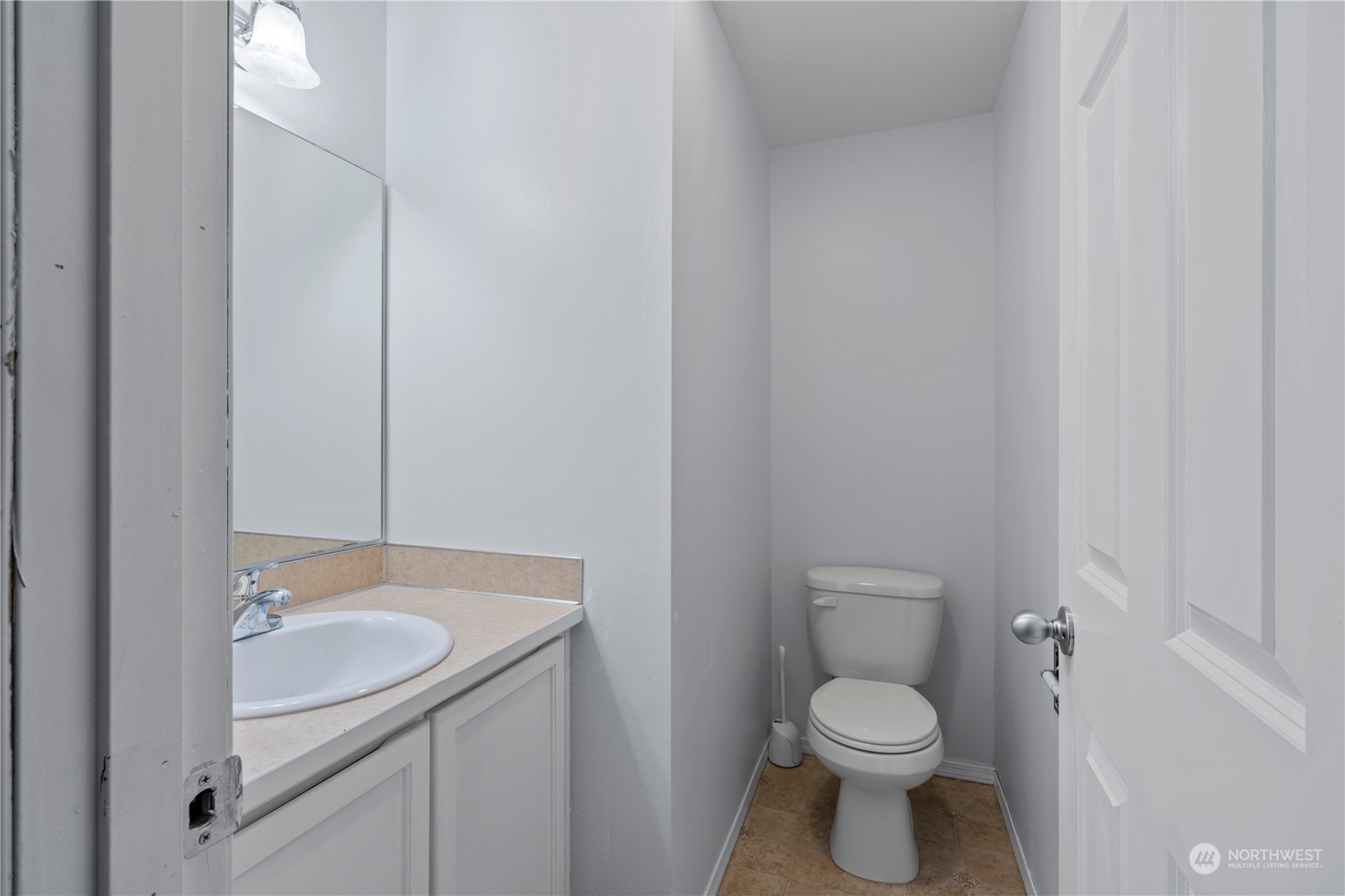8323 Cedar Grove Avenue Concrete, WA 98237 - Photo 14 of 37 a bathroom with a sink a toilet and a mirror