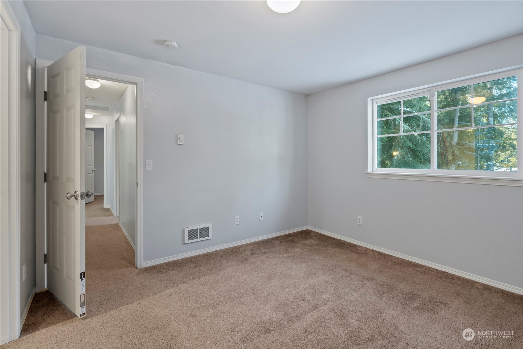 8323 Cedar Grove Avenue Concrete, WA 98237 - Photo 18 of 37 a view of an empty room with a window