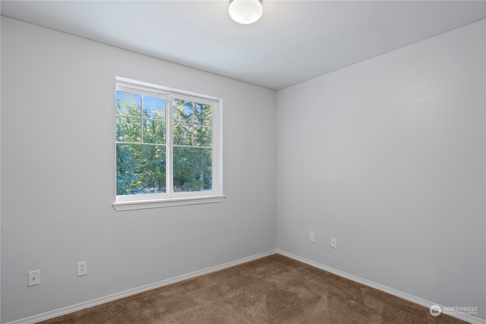8323 Cedar Grove Avenue Concrete, WA 98237 - Photo 22 of 37 an empty room with a window