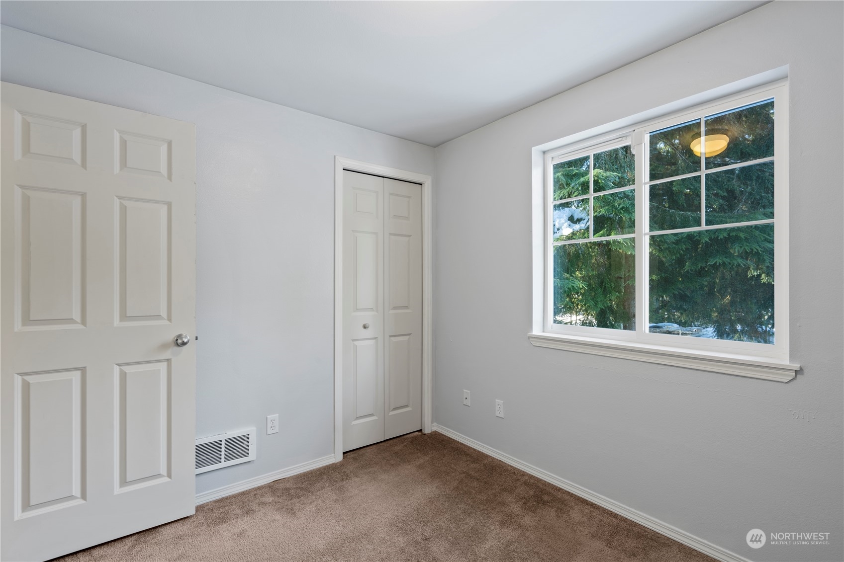 8323 Cedar Grove Avenue Concrete, WA 98237 - Photo 23 of 37 an empty room with windows
