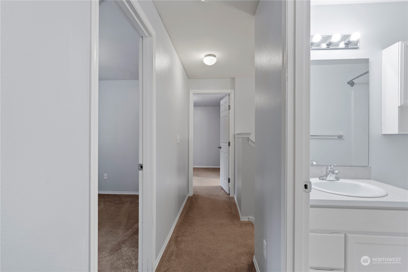 8323 Cedar Grove Avenue Concrete, WA 98237 - Photo 30 of 37 a bathroom with a sink and a mirror