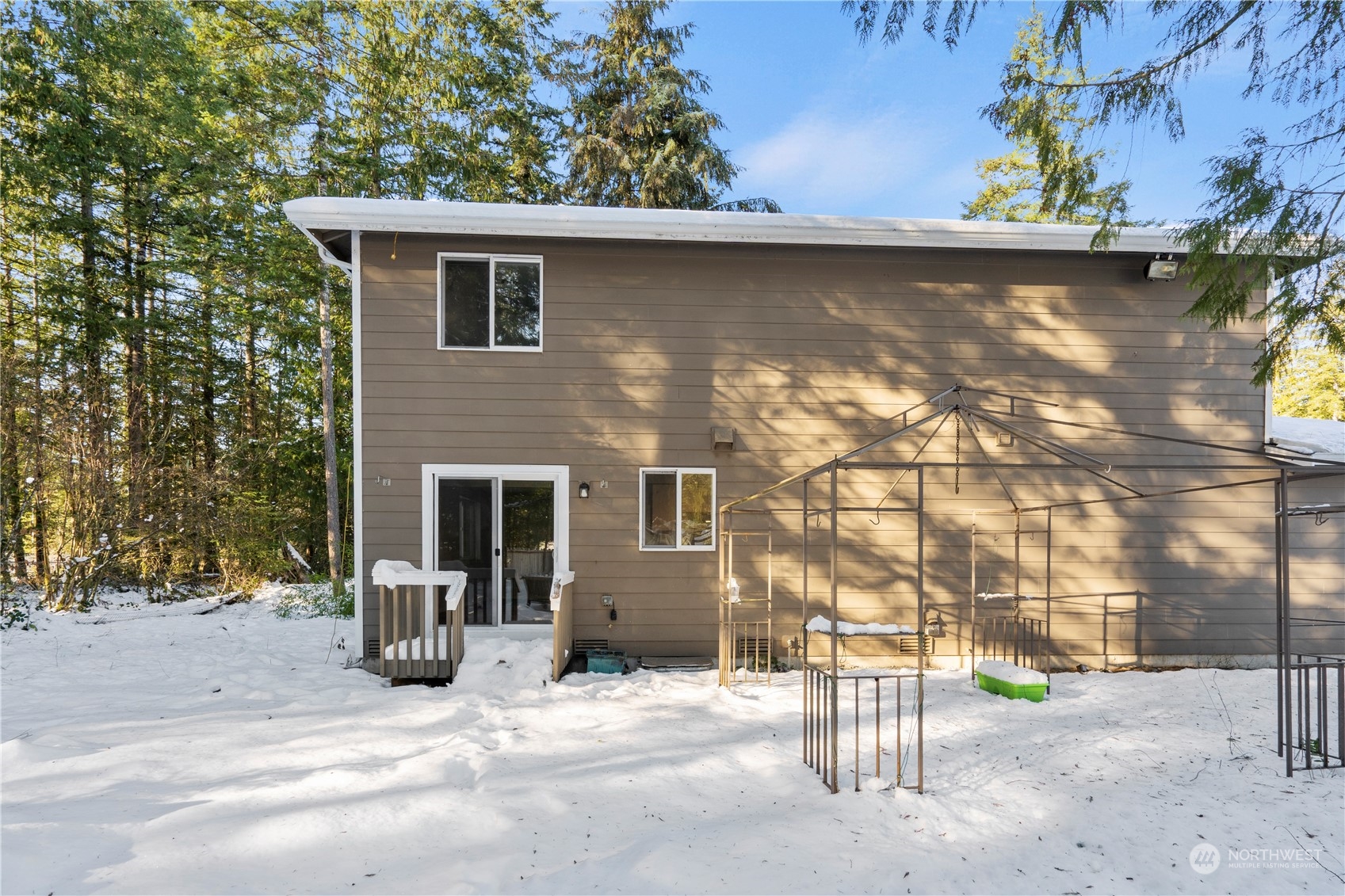 8323 Cedar Grove Avenue Concrete, WA 98237 - Photo 32 of 37 a backyard of a house with lots of green space