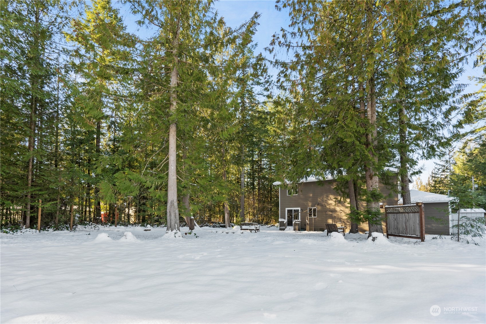 8323 Cedar Grove Avenue Concrete, WA 98237 - Photo 34 of 37 a view of a house with a tree and a yard