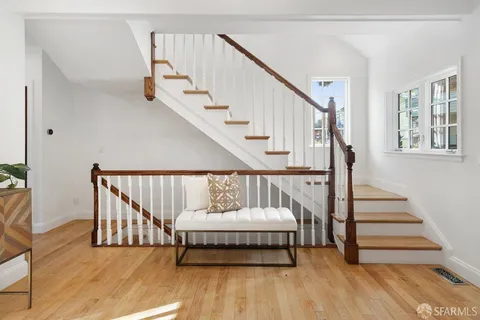 a kitchen with stainless steel appliances kitchen island granite countertop a sink and cabinets