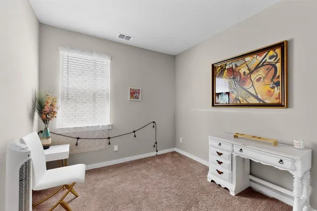 a room with furniture and window