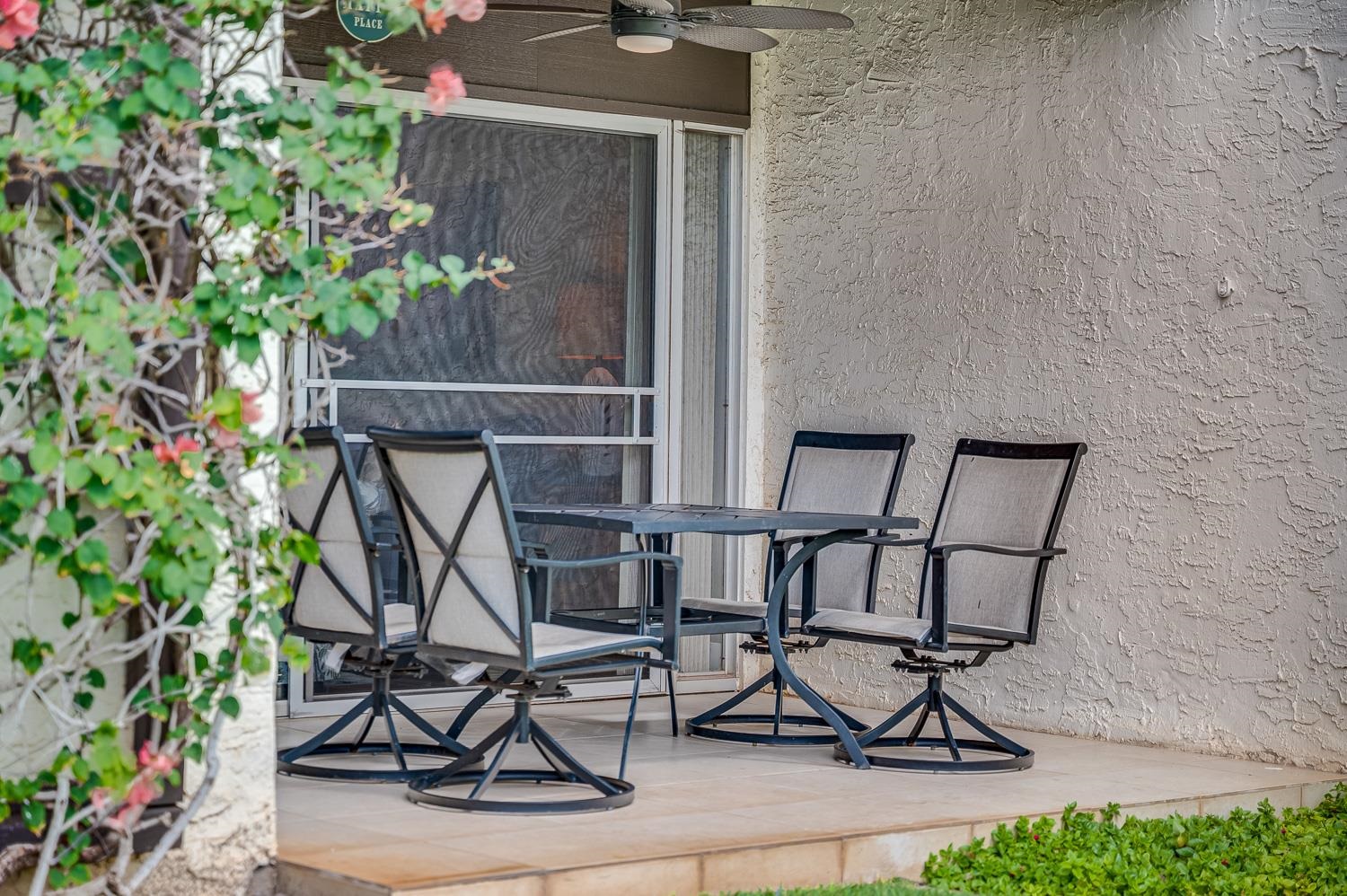 2737 South Kihei Road, Unit 142 Kihei, HI 96753 - Photo 32 of 43 a bench sitting in patio of a house