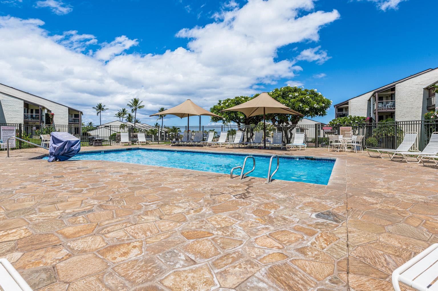 2737 South Kihei Road, Unit 142 Kihei, HI 96753 - Photo 35 of 43 a view of a house with swimming pool and sitting area